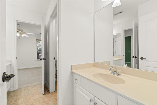 bathroom with vanity and tile patterned flooring