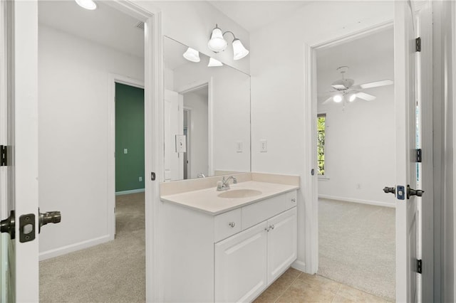 bathroom featuring tile patterned flooring and vanity