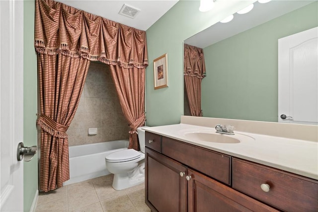 full bathroom featuring tile patterned floors, toilet, shower / bath combo with shower curtain, and vanity