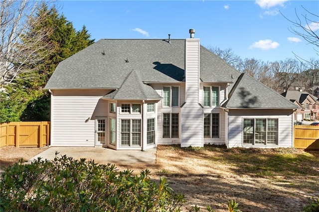 back of property with a patio area