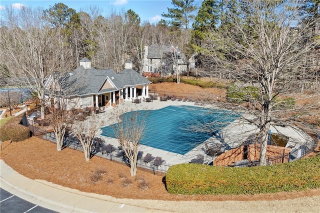 view of swimming pool featuring a patio area