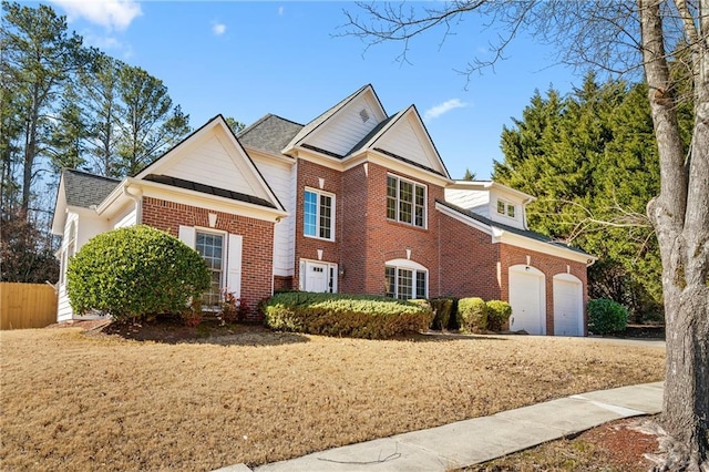 front facade with a garage