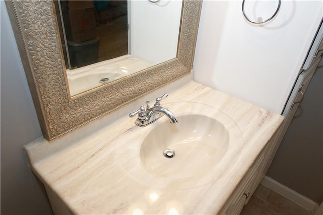 bathroom with vanity and tile patterned floors