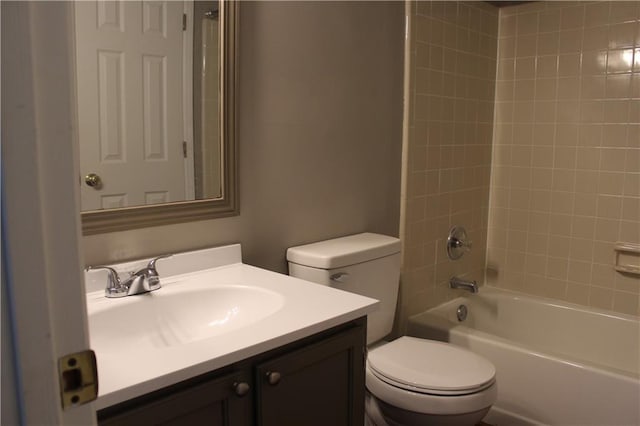 bathroom featuring shower / bath combination, vanity, and toilet