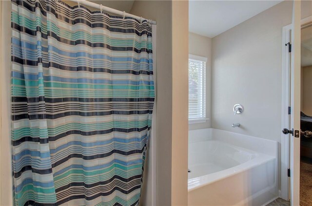 bathroom featuring plenty of natural light and vanity