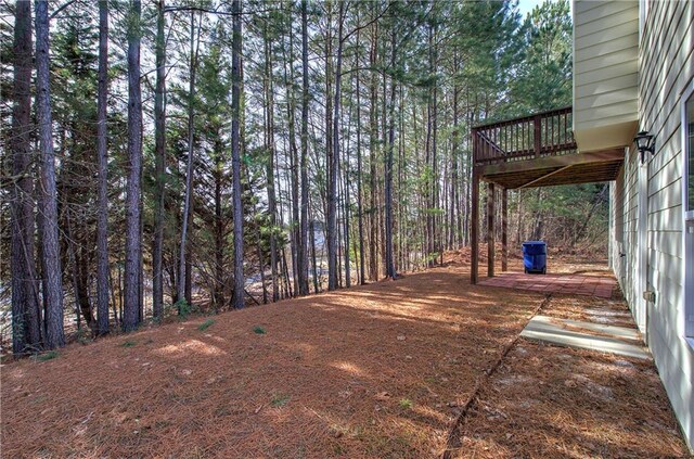 view of yard featuring a deck