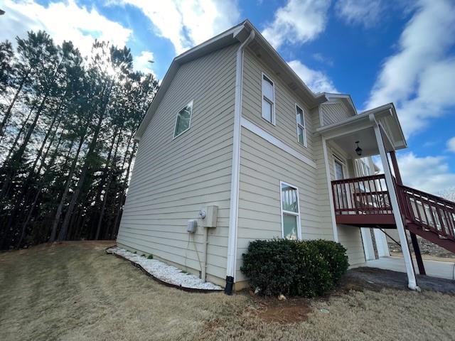 view of yard featuring a wooden deck