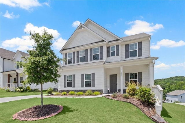 view of front of property featuring a front lawn