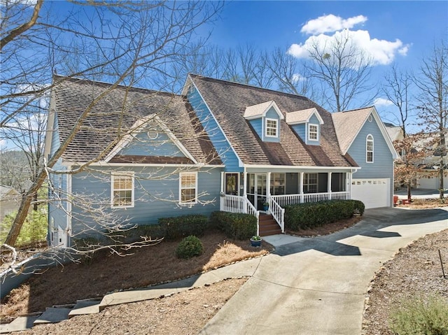 cape cod house featuring covered porch, driveway, roof with shingles, and an attached garage