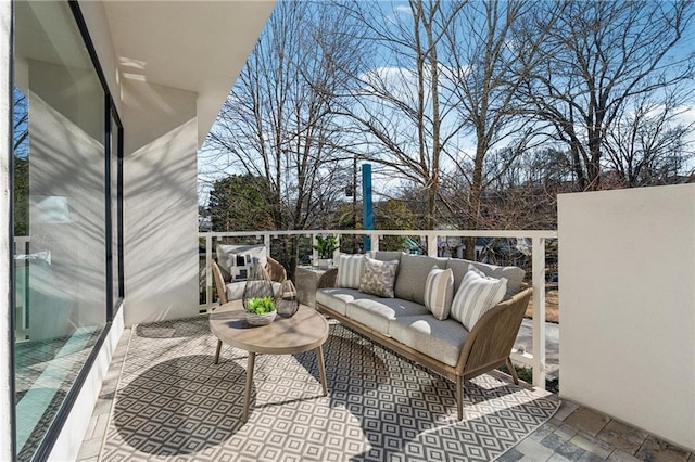 balcony featuring an outdoor living space