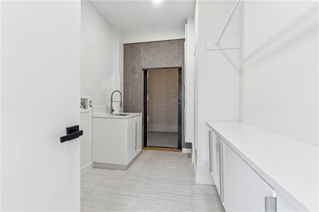 bathroom with vanity, a tile shower, and toilet