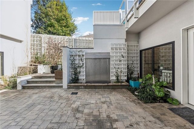 view of patio / terrace featuring mail area
