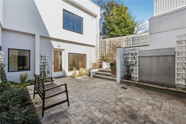 view of patio with a balcony