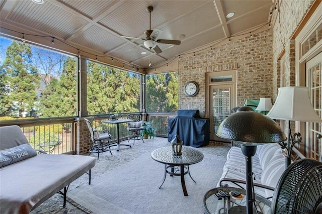 sunroom / solarium with ceiling fan