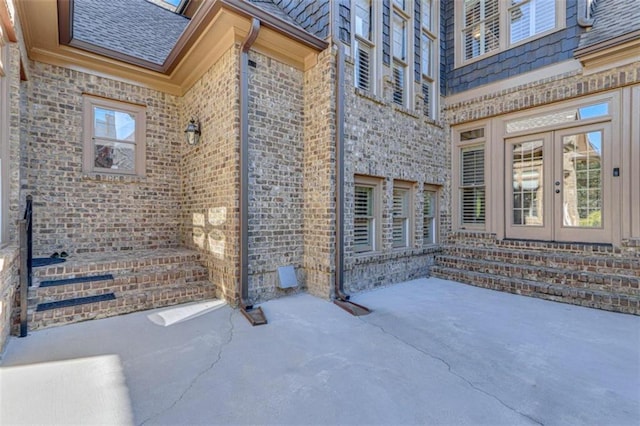 exterior space with french doors and a patio area