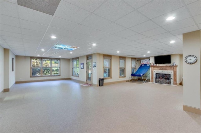 basement featuring a drop ceiling