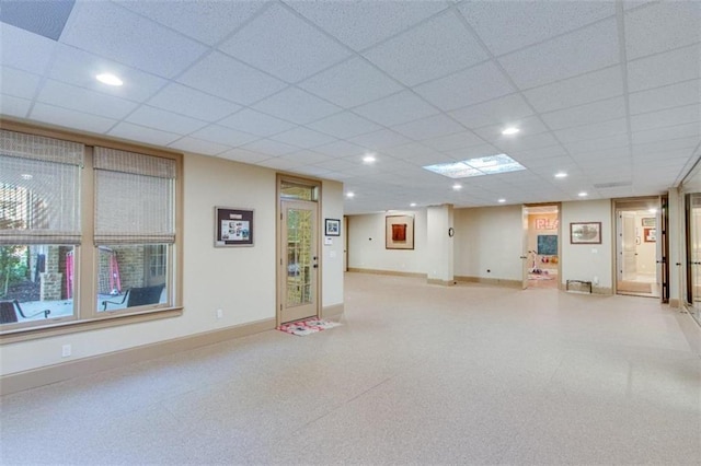 basement featuring a drop ceiling