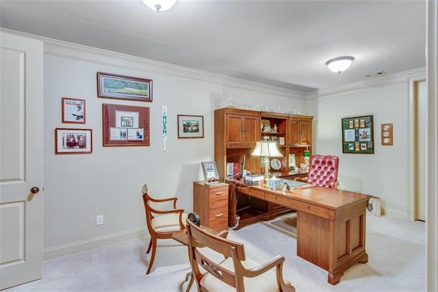 office area featuring light carpet and ornamental molding