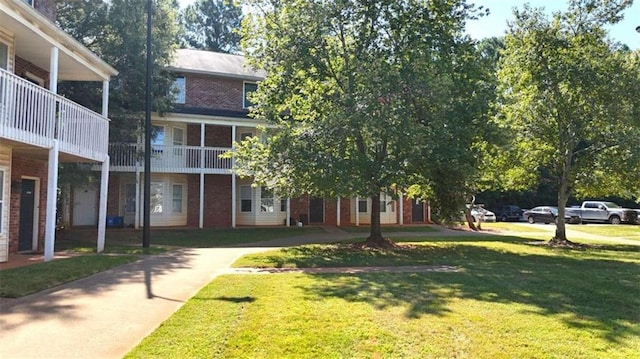 view of community with a lawn