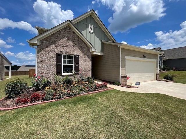 view of front of home featuring a front lawn and a garage