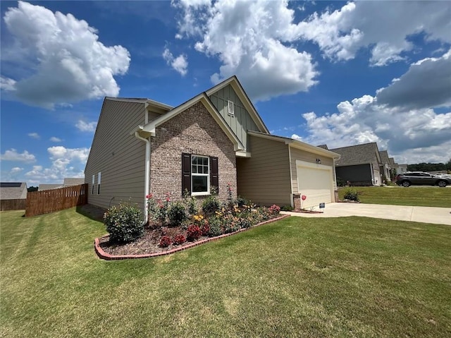 view of front facade with a front yard and a garage