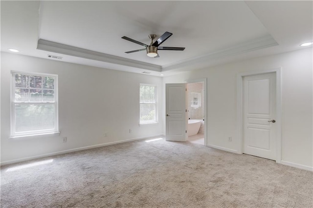 7653 Legacy Rd, Flowery Branch, GA 30542 - unfurnished bedroom featuring a raised ceiling, baseboards, light colored carpet, ornamental molding, and recessed lighting