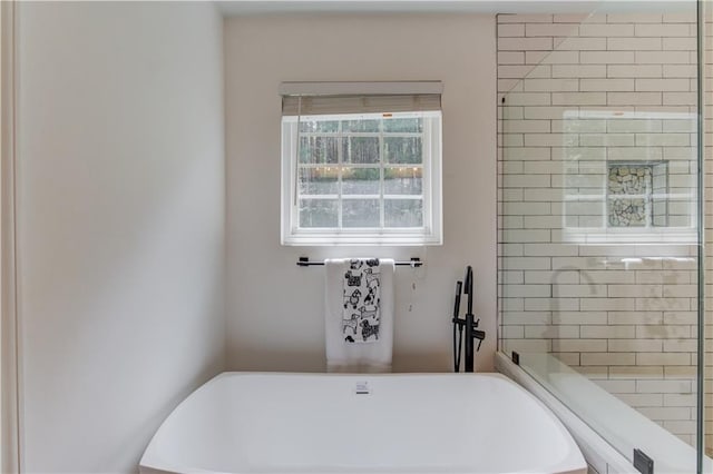 7653 Legacy Rd, Flowery Branch, GA 30542 - full bath with a soaking tub