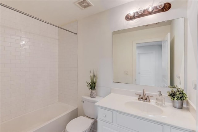 7653 Legacy Rd, Flowery Branch, GA 30542 - full bathroom with toilet, vanity, and washtub / shower combination
