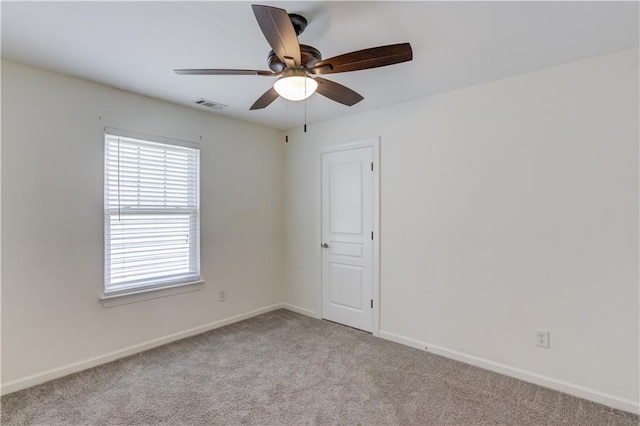 7653 Legacy Rd, Flowery Branch, GA 30542 - carpeted spare room with ceiling fan and baseboards
