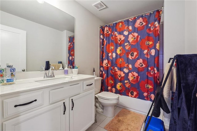 full bathroom with shower / bath combo with shower curtain, tile patterned flooring, vanity, and toilet