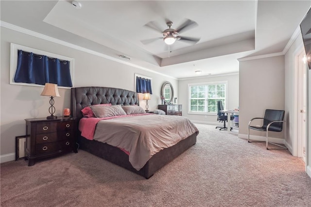 bedroom featuring carpet flooring, ceiling fan, and a raised ceiling