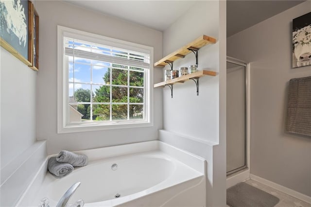 244 Bryn Brooke Dr, Dawsonville, GA 30534 - bathroom with a garden tub, a stall shower, and tile patterned floors
