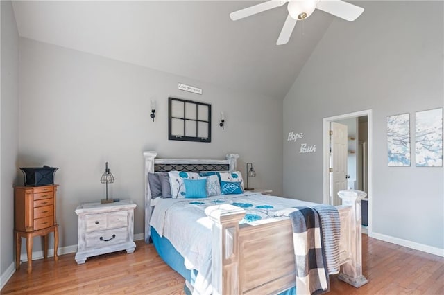 244 Bryn Brooke Dr, Dawsonville, GA 30534 - bedroom featuring wood finished floors, high vaulted ceiling, baseboards, a ceiling fan, and ensuite bath