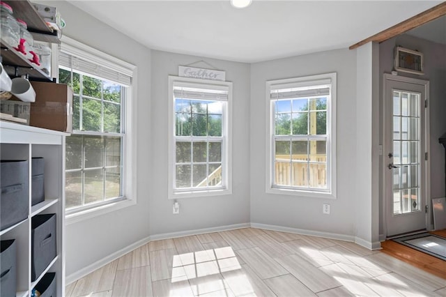 244 Bryn Brooke Dr, Dawsonville, GA 30534 - unfurnished dining area with plenty of natural light, baseboards, and wood finished floors