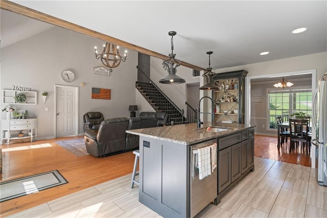 244 Bryn Brooke Dr, Dawsonville, GA 30534 - kitchen with a chandelier, a sink, appliances with stainless steel finishes, stone counters, and open floor plan