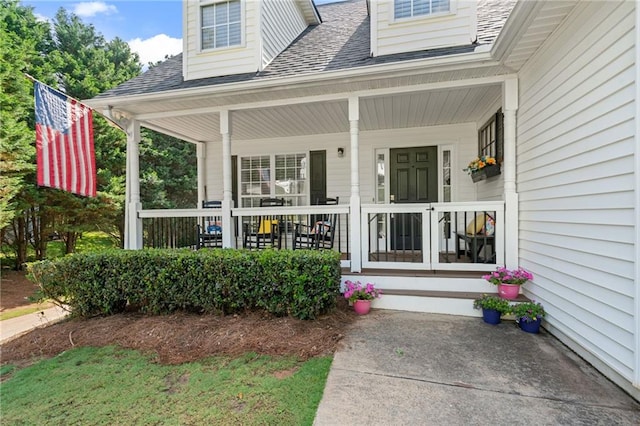 244 Bryn Brooke Dr, Dawsonville, GA 30534 - doorway to property featuring roof with shingles and a porch
