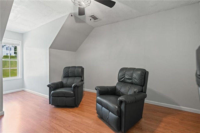 244 Bryn Brooke Dr, Dawsonville, GA 30534 - sitting room featuring wood finished floors, ceiling fan, lofted ceiling, baseboards, and a textured ceiling