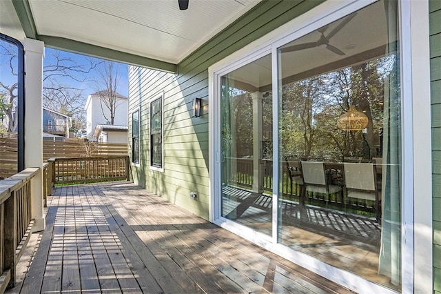 wooden terrace with ceiling fan