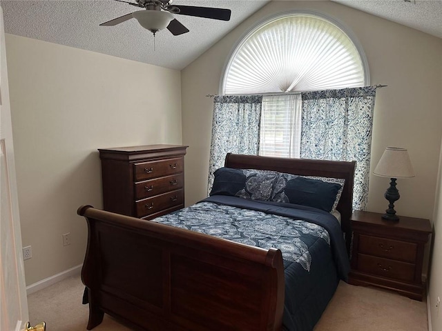 2191 Rockbridge Rd Unit 2603, Stone Mountain, GA 30087 - bedroom featuring light colored carpet, lofted ceiling, a textured ceiling, and ceiling fan