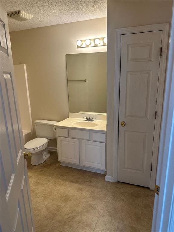 2191 Rockbridge Rd Unit 2603, Stone Mountain, GA 30087 - bathroom featuring vanity and a textured ceiling