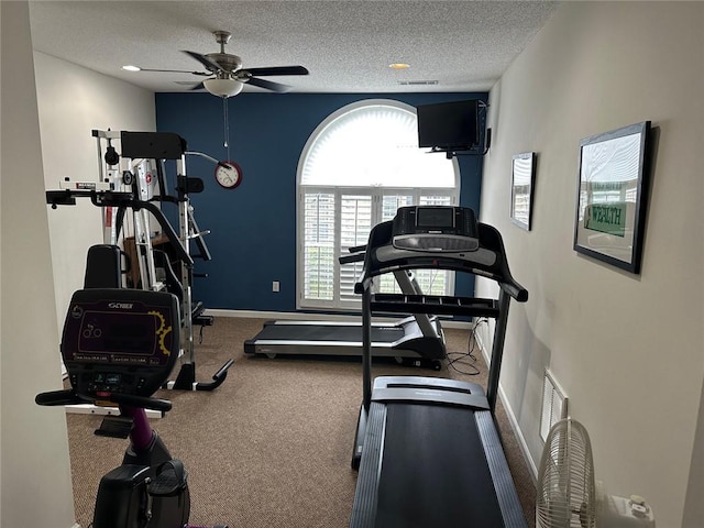 2191 Rockbridge Rd Unit 2603, Stone Mountain, GA 30087 - workout area featuring baseboards, ceiling fan, a textured ceiling, and carpet
