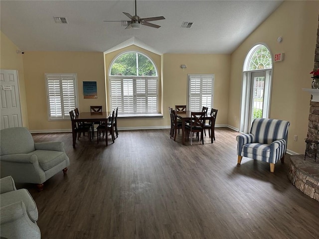 2191 Rockbridge Rd Unit 2603, Stone Mountain, GA 30087 - living room with vaulted ceiling, plenty of natural light, dark wood-style floors, ceiling fan, and a fireplace