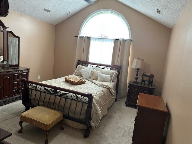 2191 Rockbridge Rd Unit 2603, Stone Mountain, GA 30087 - bedroom featuring light carpet, a textured ceiling, and lofted ceiling