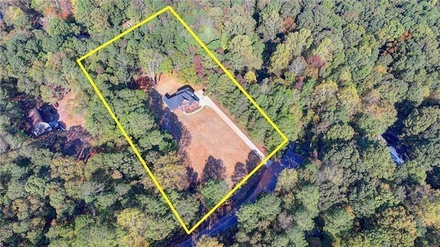 aerial view featuring a forest view