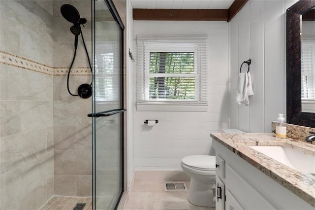 bathroom with vanity, toilet, and an enclosed shower