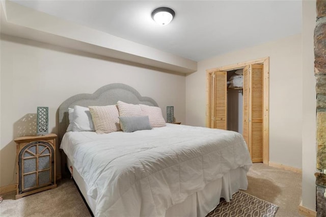 carpeted bedroom with a closet