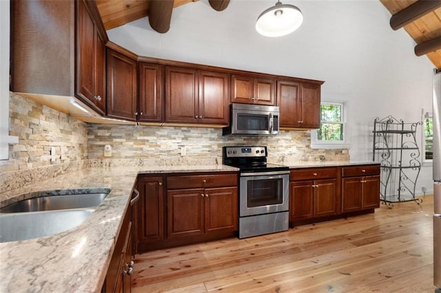 kitchen with beamed ceiling, backsplash, wood ceiling, light hardwood / wood-style floors, and stainless steel appliances