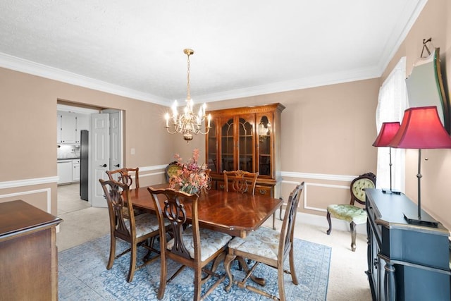 dining area with light carpet, crown molding, and a chandelier