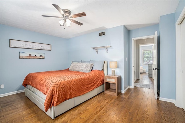 6700 Roswell Rd NE Unit 25A, Sandy Springs, GA 30328 - bedroom with wood finished floors, baseboards, and ceiling fan