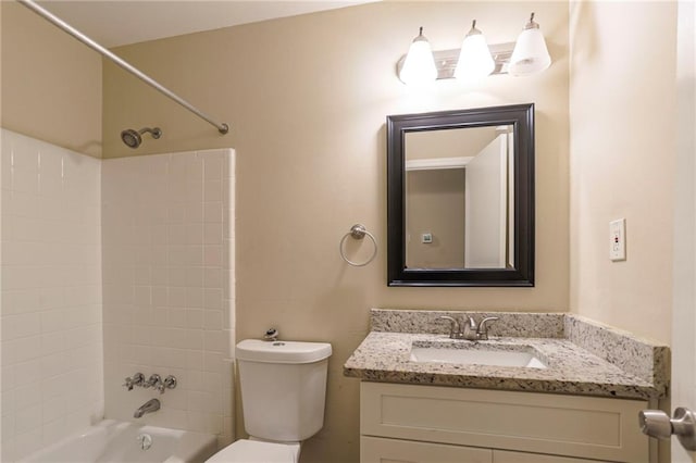 full bathroom with shower / bathing tub combination, vanity, and toilet